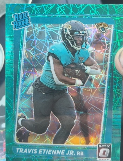 2021 Donruss Optic #214 Travis Etienne Jr — front