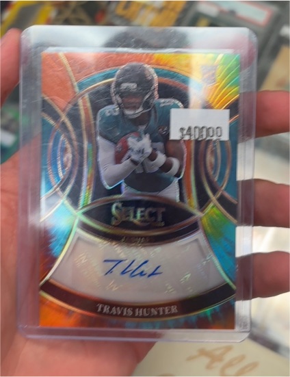 2025 Panini Select Rookie Signatures Prizm #RSI-THR Travis Hunter — front
