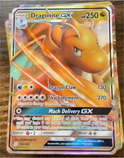 2019 Pokémon Unified Minds #152 Dragonite GX — front