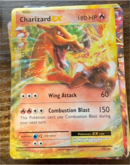 2016 Pokémon #12 Charizard EX — front
