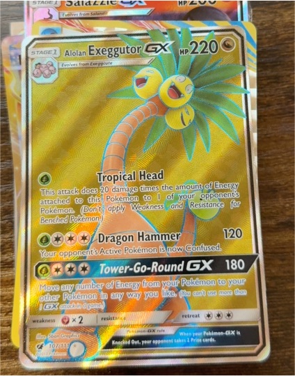 2017 Pokémon TCG Crimson Invasion #107 Alolan Exeggutor GX — front