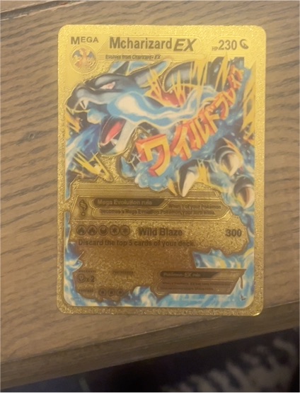 2020 Pokémon M Charizard EX #69 — front