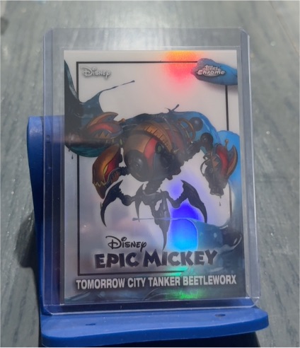 2026 Topps Disney Neon Chrome #EM-8 Tomorrow City Tanker Beetleworx Epic Mickey — front