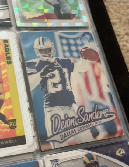 1996 Fleer #21 Deion Sanders — front
