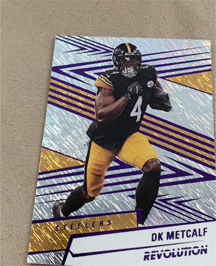2025 Panini Revolution #17 DK Metcalf — front