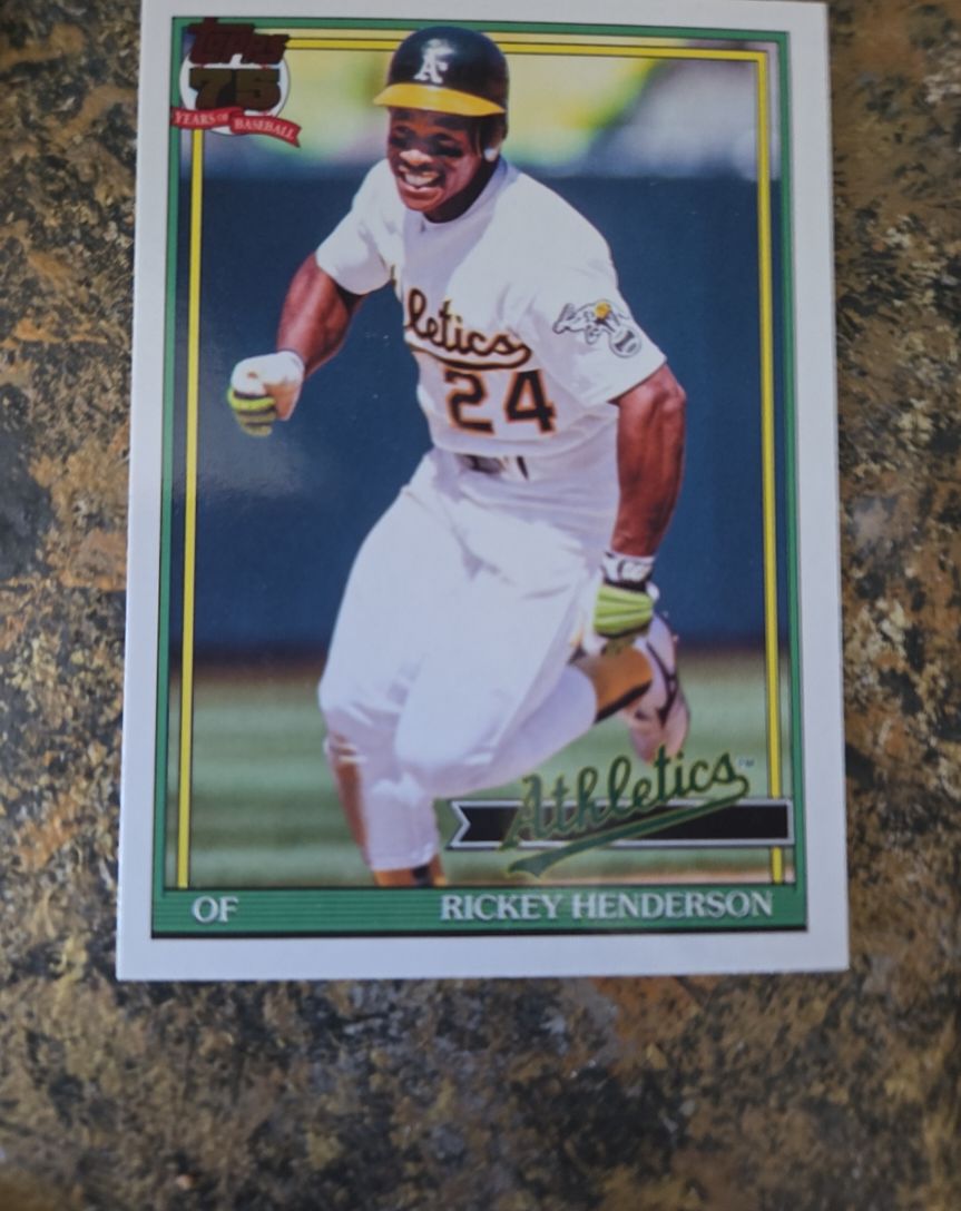 1991 Topps #T91-52 Rickey Henderson — front
