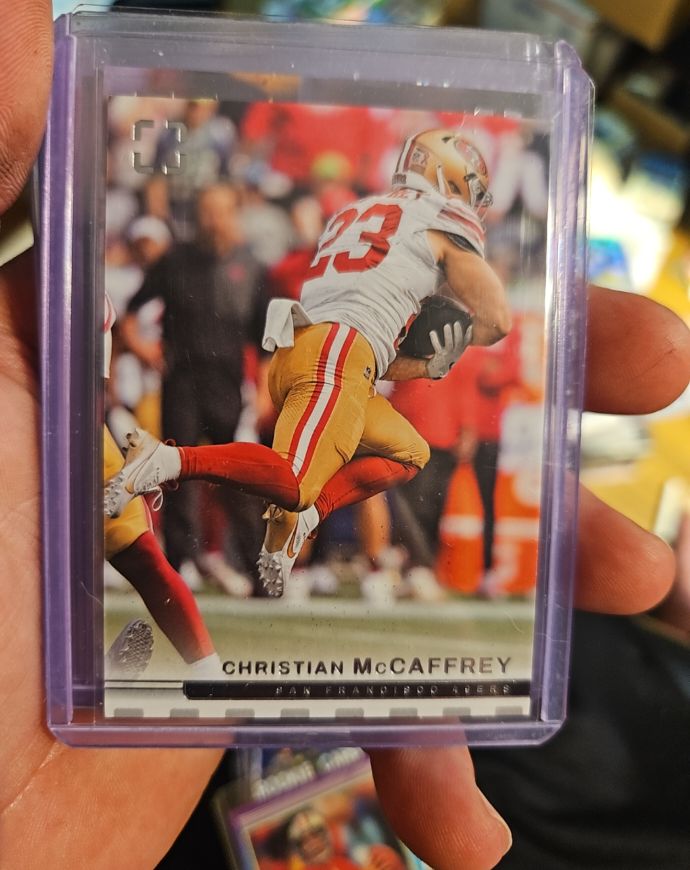 2025 Panini Photogenic #48 Christian McCaffrey — front