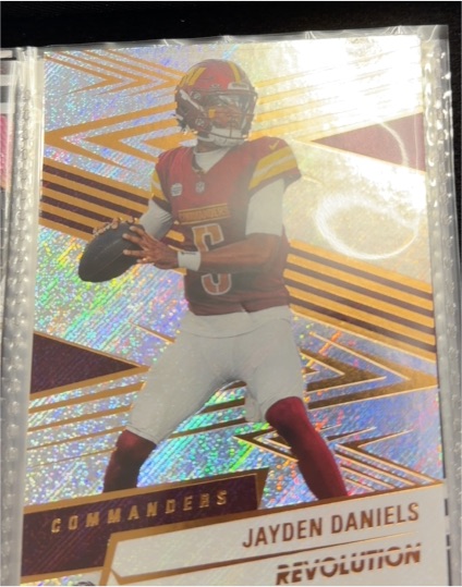 2025 Panini Revolution #1 Jayden Daniels — front