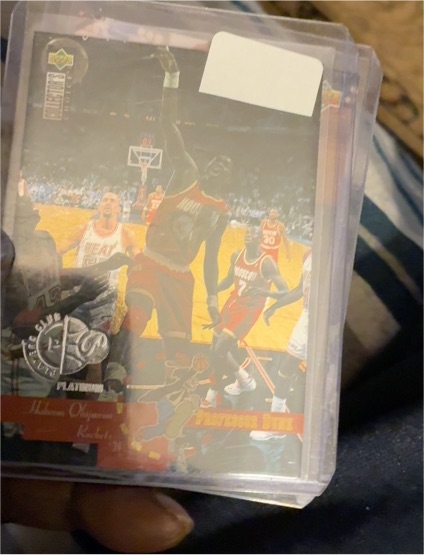 1995 Upper Deck #196 Hakeem Olajuwon Platinum Player's Club — front