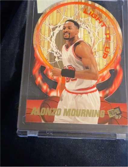 1997 Press Pass Double Threat #LU17 Alonzo Mourning Light It Up — front