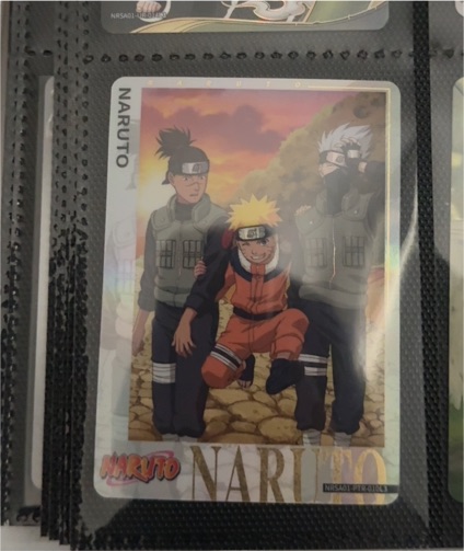2025 Kayou Naruto Series 1 #NRSA01-PTR-010L3 Naruto Uzumaki with Iruka Umino & Kakashi Hatake — front