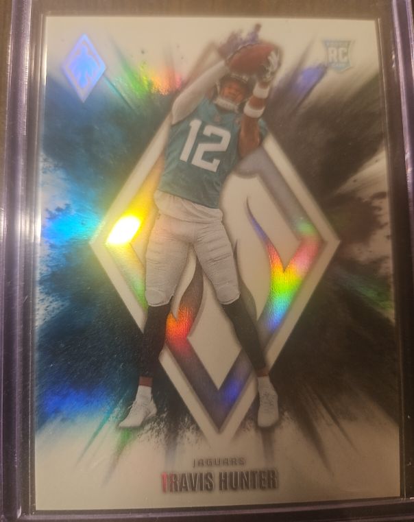 2025 Panini Phoenix #7 Travis Hunter Color Blast — front