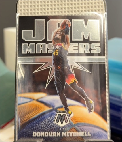 2021-22 Panini Mosaic #7 Donovan Mitchell Jam Masters — front