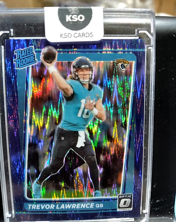 2021 Donruss Optic #201 Trevor Lawrence Purple Shock Prizm Rated Rookie — front
