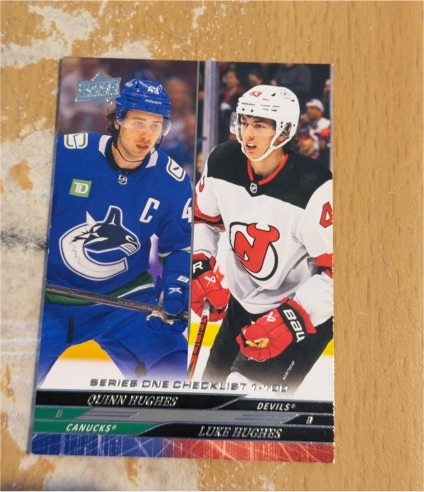 2024-25 Upper Deck Series 1 #199 Quinn Hughes / Luke Hughes — front