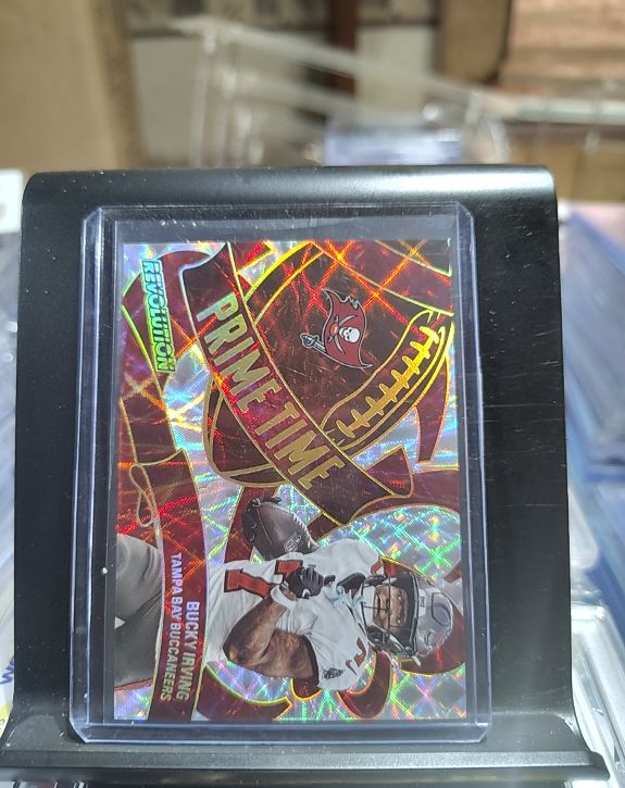 2025 Panini Revolution #18 Bucky Irving Prime Time Performers — front
