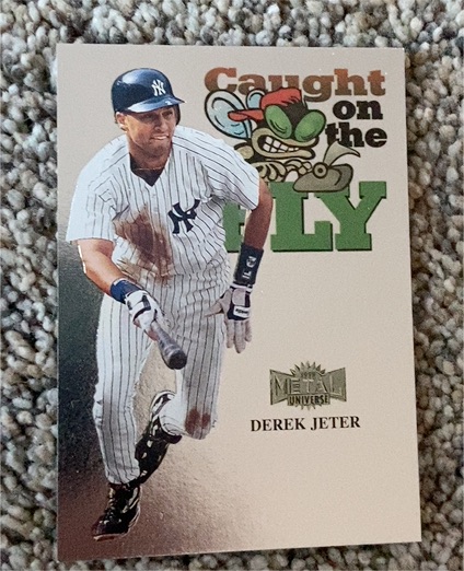 1999 Skybox Metal Universe #238 Derek Jeter Caught on the Fly — front