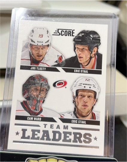 2013-14 Score #555 Cam Ward / Eric Staal / Jiri Tlusty / Eric Staal — front