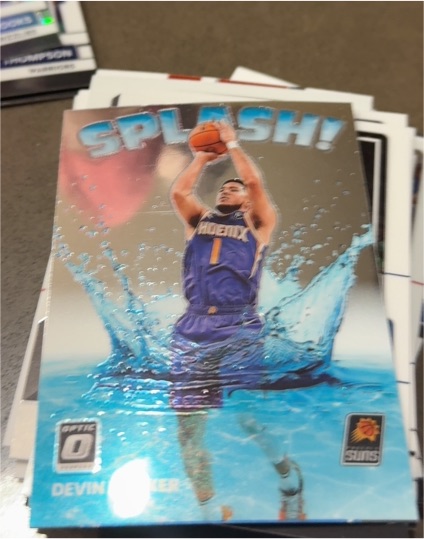 2022-23 Panini Donruss Optic #12 Devin Booker Splash! — front