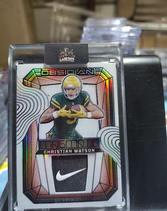 2024 Panini Obsidian Magmatic Memorabilia #MM-CWN Christian Watson — front