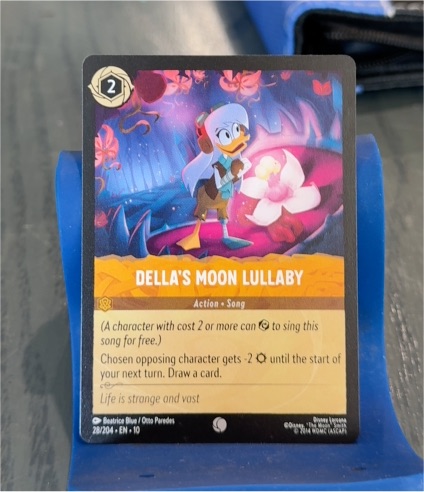 Disney Lorcana Whispers in the Well #28 Della's Moon Lullaby — front
