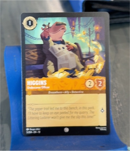 Disney Lorcana Whispers in the Well #5/204 Higgins - Undercover Officer — front