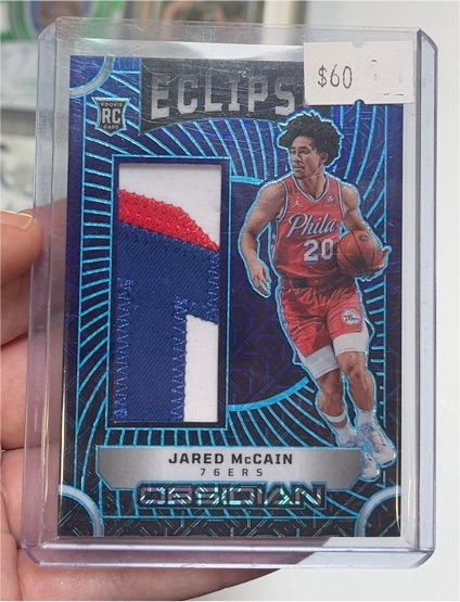 2024-25 Panini Obsidian #EM-JMC Jared McCain — front