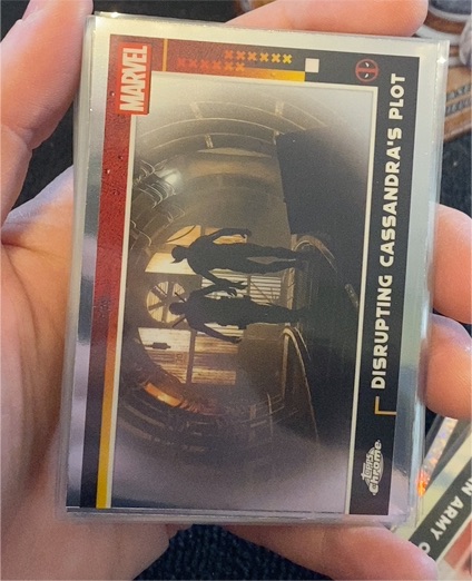 2025 Topps Chrome #100 Deadpool & Wolverine Disrupting Cassandra's Plot — front