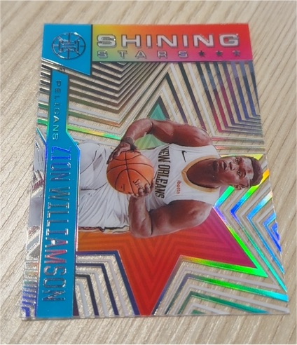 2020-21 Panini Illusions #13 Zion Williamson Shining Stars — front