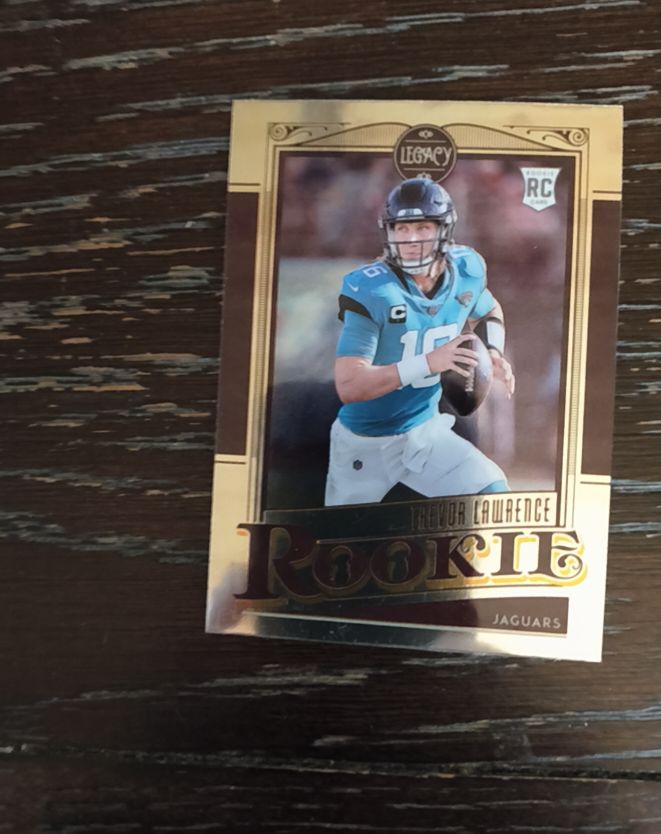 2021 Panini Chronicles Legacy Update Rookies #215 Trevor Lawrence — front