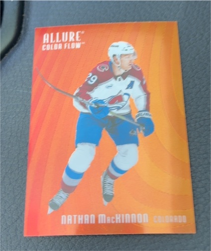 2025-26 Upper Deck Allure #CF-20 Nathan MacKinnon Color Flow Red-Orange — front