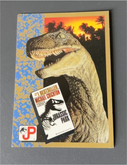 1993 Topps Jurassic Park #71 The Novel By Michael Crichton — front