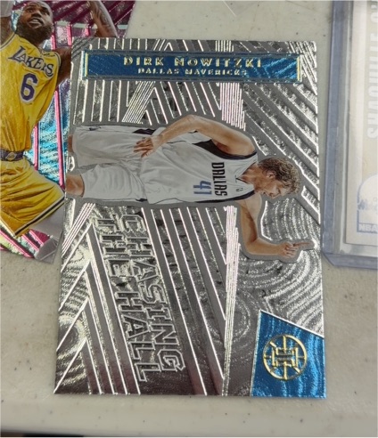 2021-22 Panini Illusions #12 Dirk Nowitzki Chasing the Hall — front