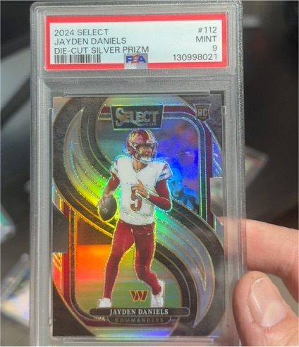 2024 Panini Select #112 Jayden Daniels Die-Cut Silver Prizm — front
