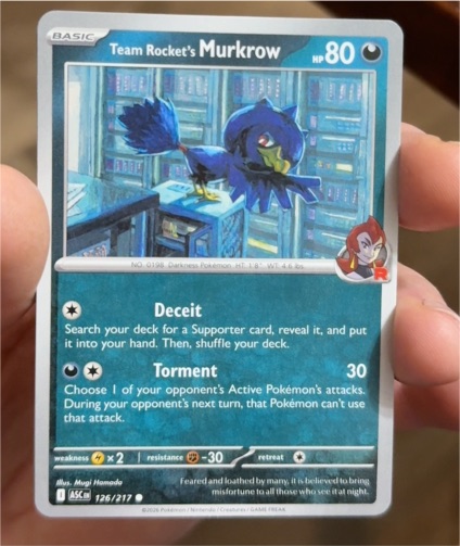 2025 Pokemon #126 Team Rocket's Murkrow — front