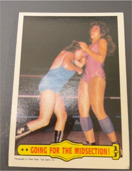 1985 Topps WWF #25 Going For The Midsection! Fabulous Moolah & Wendi Richter — front