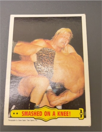 1985 Topps WWF #33 Greg Valentine Smashed On A Knee! — front
