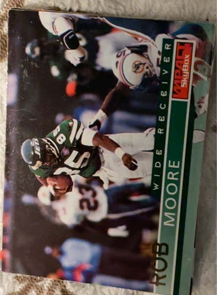1995 SkyBox Impact #107 Rob Moore — front