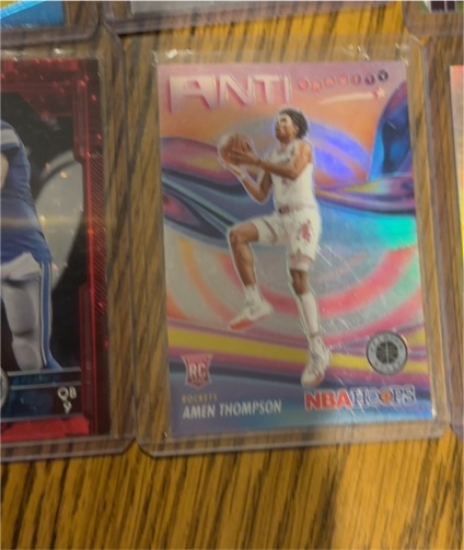 2023-24 Panini NBA Hoops Premium Stock #16 Amen Thompson Anti-Gravity Silver Prizm Rookie Card — front