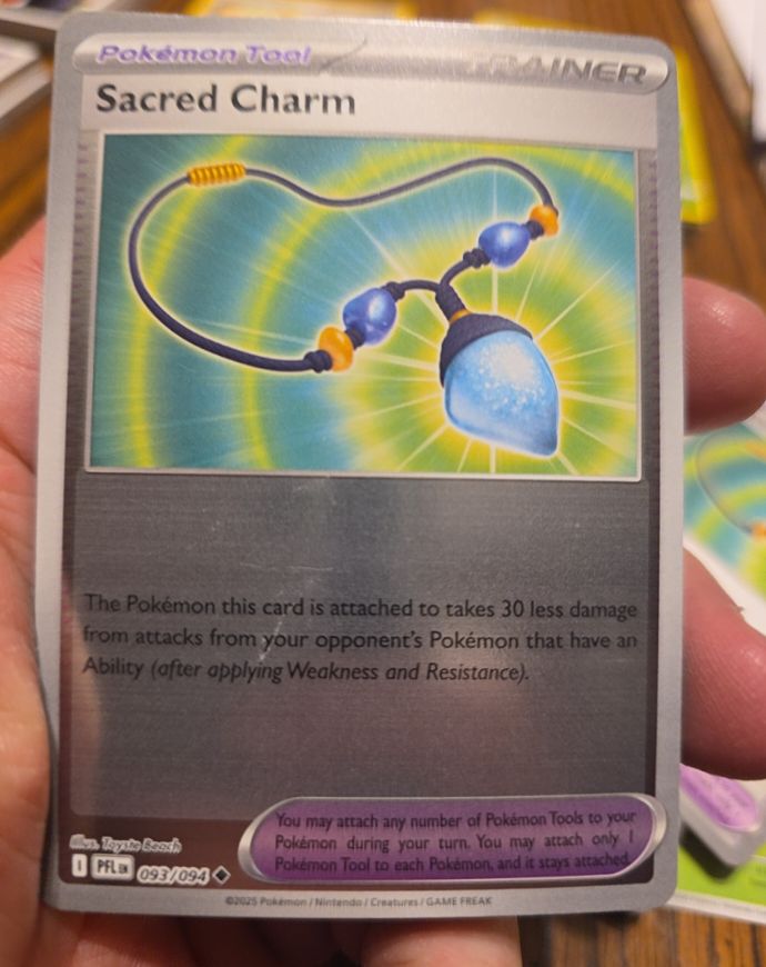 2025 Pokémon #093 Sacred Charm — front