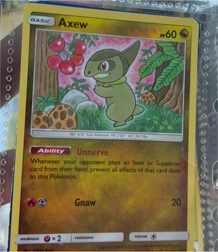 2019 Pokémon TCG Unified Minds #154 Axew — front