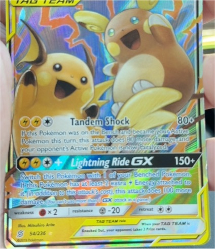 2019 Pokémon TCG Unified Minds #54 Raichu & Alolan Raichu GX — front