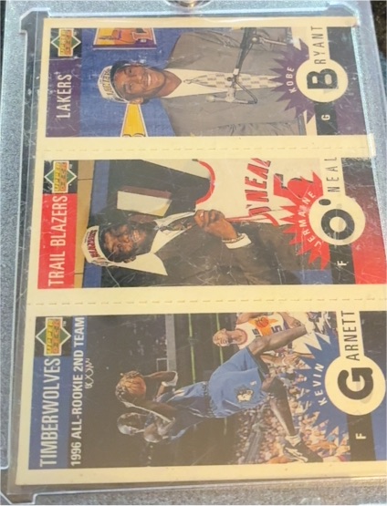 1996-97 Upper Deck Collector's Choice Mini #M129 Kobe Bryant / Kevin Garnett / Jermaine O'Neal Rookie Card — front