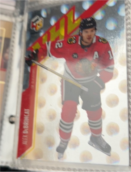 2021-22 Upper Deck Extended Series HoloGrFX #NHL-13 Alex DeBrincat — front