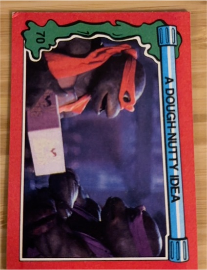 1991 Topps Teenage Mutant Ninja Turtles II: The Secret of Ooze Movie #70 A Dough Nutty Idea — front