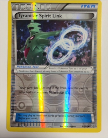 2015 Pokémon Ancient Origins #81 Tyranitar Spirit Link — front