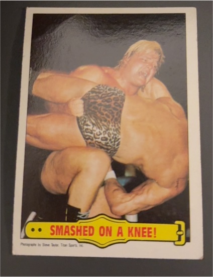 1985 Topps WWF #33 Greg Valentine Smashed On A Knee! — front