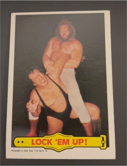 1985 Topps WWF #23 Lock 'Em Up! Big John Studd — front