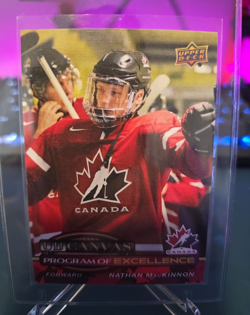 2025-26 Upper Deck Series 2 UD Canvas Program of Excellence #C-257 Nathan MacKinnon — front