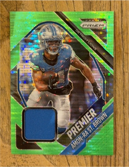 2025 Panini Prizm Premier Jerseys #PJY-ASB Amon-Ra St. Brown — front